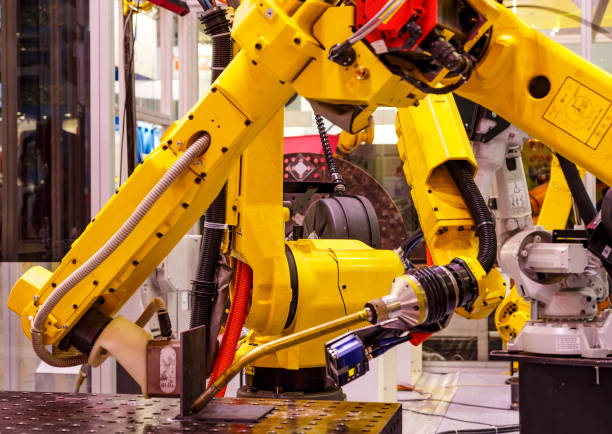 istock Robotic hand machine tool at industrial manufacture smart factory 1164725056