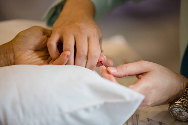 istock Process of drawing blood from a finger for hematocrit test. 1164731408