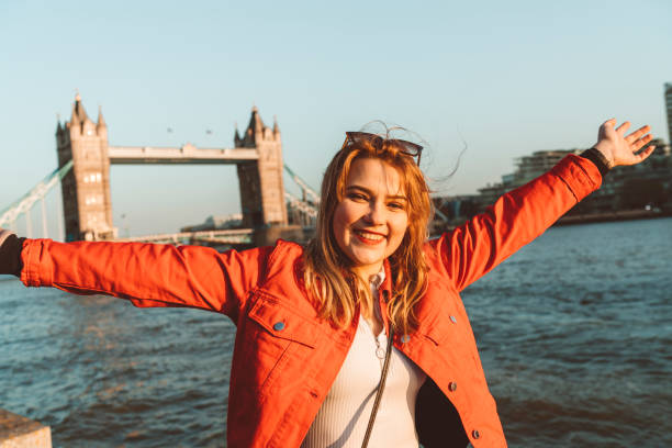 istock Smiling exchange student exploring London on her free time 1164733014