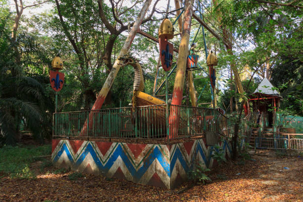 In Yangon, South of the Yangon Zoological Gardens, there is an abandoned amusement park. The vibe is post apocalyptic.