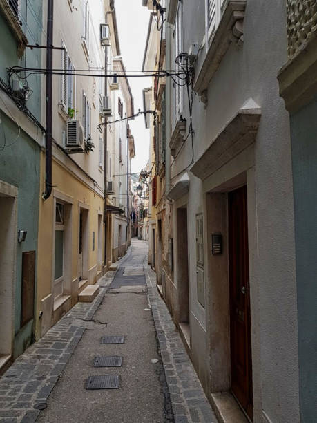 istock a small alley italian style 1164751080