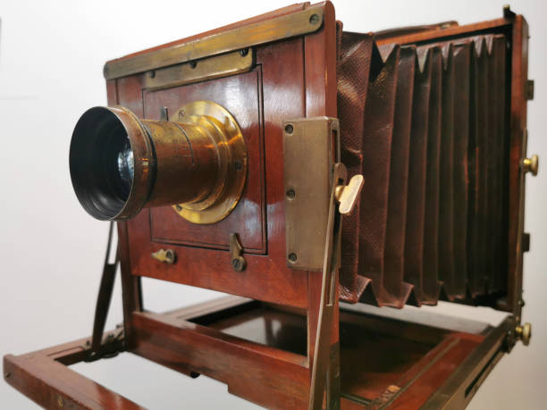 istock wood and bronze old camera 1164760425