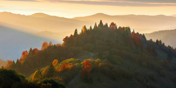 istock beautiful autumn sunset in mountains 1164760912