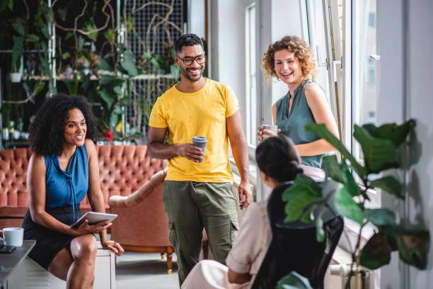 istock Relaxed Group of Business Colleagues Discussing Ideas 1164762971