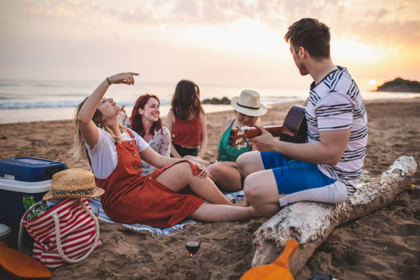 istock Chilling on the beach with his favorite audience 1164766098