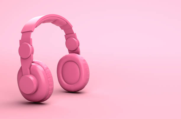 istock Minimal pink background headphones 1164769191