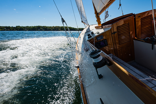 Luna, a Buzzards Bay 25, sailing close hauled off the shores of Deer Isle, Maine.