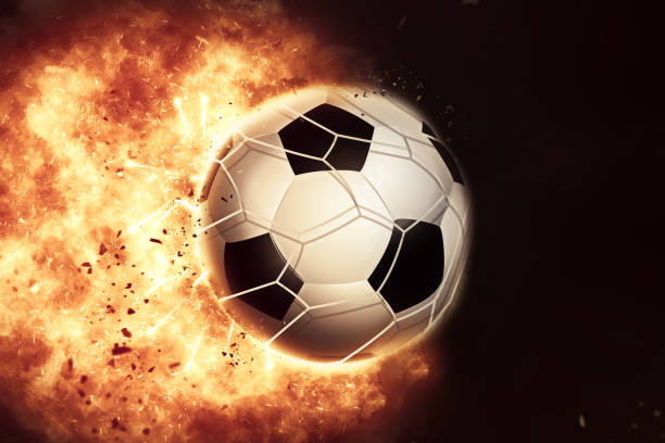 istock 3D eploding fiery football / soccer ball 1164778266