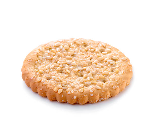 istock cookie with sugar and sesame seed close-up isolated on white background 1164786454