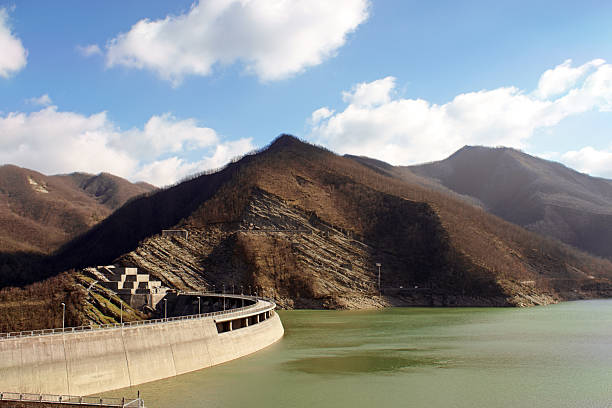 View of the heart wall of the dam of Ridracoli, the lake and the Apennines on a winter day