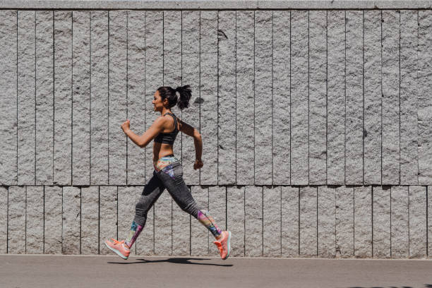 istock Athlete woman training on the road 1164788439