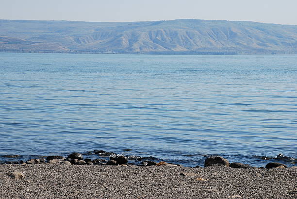 Sea of Galilee The Sea of Galilee, location of many New Testament stories, with the Golan Heights in the background. galilee photos stock pictures, royalty-free photos & images