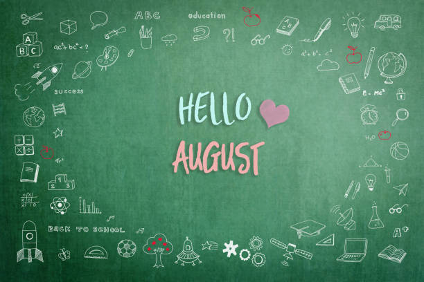 istock Hello August greeting on green school teacher's chalkboard with creative student's doodle of learning education graphic freehand illustration icon for back to school month concept 1164801403