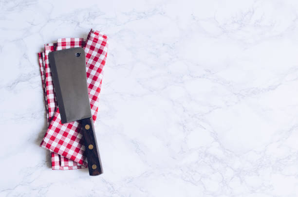 Vintage meat knife over marble table