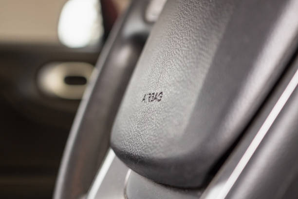 istock Safety airbag sign on car steering wheel 1164802186