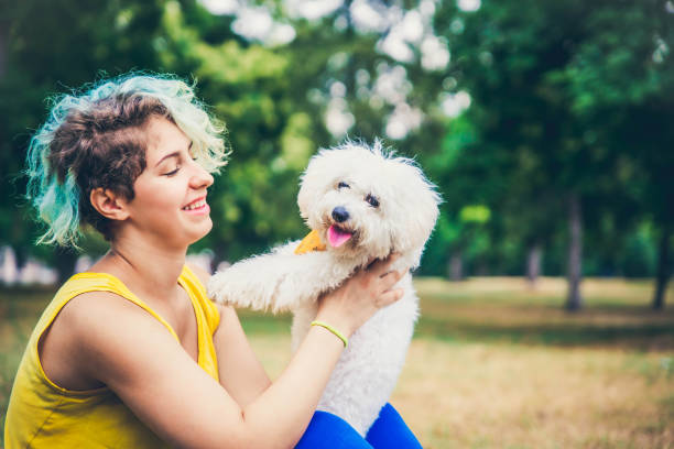 istock Young woman Enjoying with her dog. 1164803148