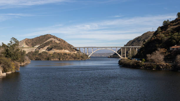 istock Power plant reservoir lake and bridge 1164803909