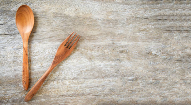 istock Wooden spoon and fork kitchenware set on wooden table - Zero waste use less plastic concept 1164803940