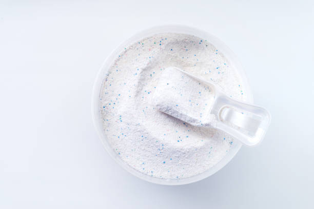 istock washing powder with measuring cup on a washing powder box 1164818270