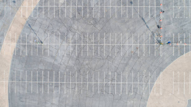 istock Aerial Parking Lot Symmetry 1164824174