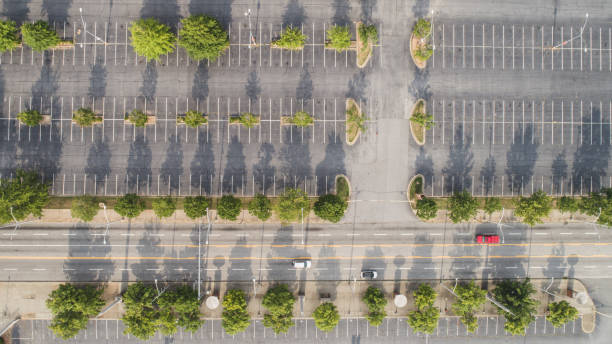 istock Aerial Parking Lot Symmetry 1164824182