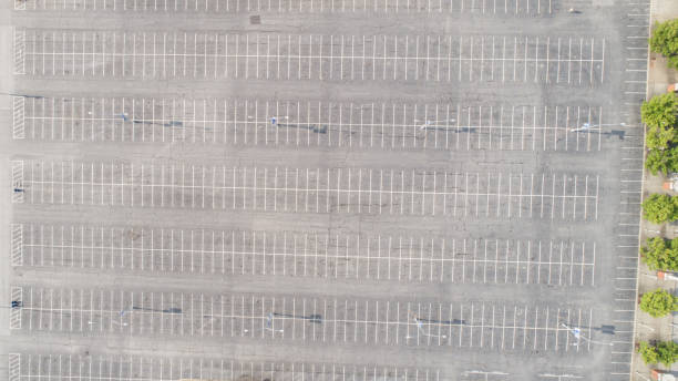 istock Aerial Parking Lot Symmetry 1164824186