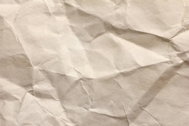 istock Clean brown paper, wrinkled, abstract for background. 1164824560
