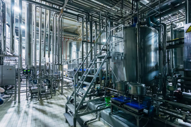 istock Modern brewery production steel vats connected by pipes 1164825337