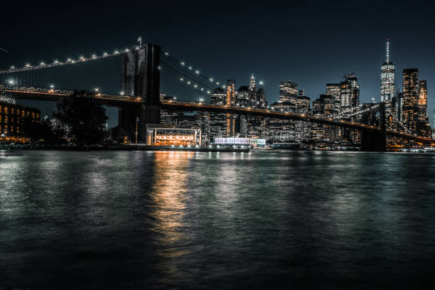 istock Brooklyn Bridge Financial District and East river long exposure 1164825483