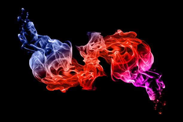 istock Movement of colorful smoke on black background. 1164825534