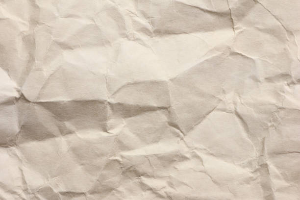 istock Clean brown paper, wrinkled, abstract for background. 1164825568