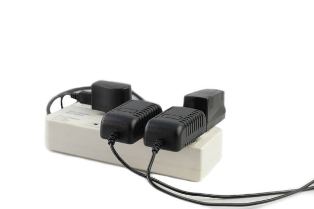 istock Multiple socket with connected power Strip with a bunch of plugs and adapter on white background 1164831861