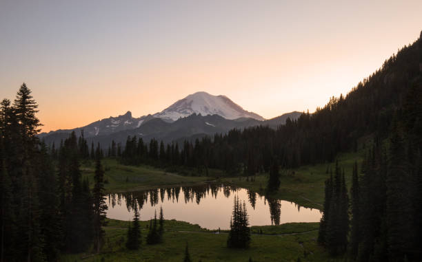 istock Panoramic view of Mount Rainier at sunset 1164833665