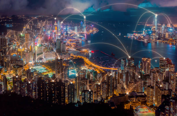 Aerial view of Hong Kong city with connection network technology. Wireless network.global communication.internet of thing.smart city concept.big data Aerial view of Hong Kong city with connection network technology. Wireless network.global communication.internet of thing.smart city concept.big data hong kong business district stock pictures, royalty-free photos & images