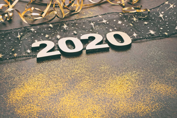 istock Happy New Year 2020. Symbol from number 2020 on stone background 1164834874