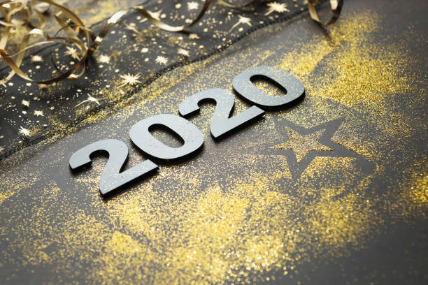 istock Happy New Year 2020. Symbol from number 2020 on stone background 1164835028