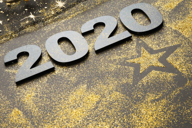 istock Happy New Year 2020. Symbol from number 2020 on stone background 1164835035