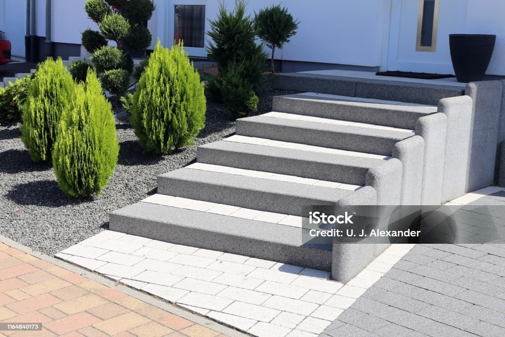 Neat And Tidy Front Yard With Solid Block Steps Decorative Gravel And Planting Stock Photo - Download Image Now - iStock Neat And Tidy Front Yard With Solid Block Steps Decorative Gravel And Planting Stock Photo - Download Image Now - Istock