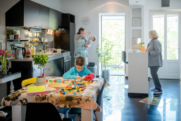 istock Grandmother visiting her daughter and grandsons 1164842876