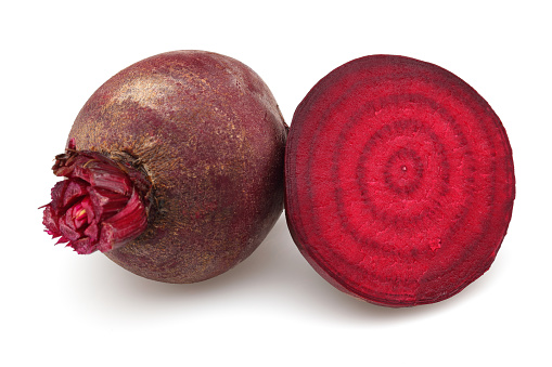 Fresh red beet roots isolated on white background