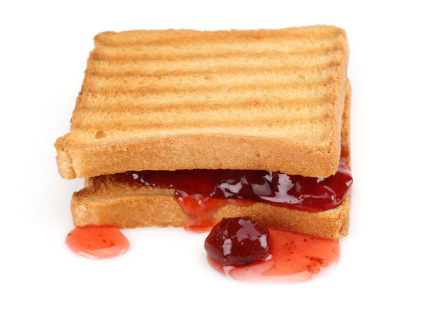 istock Toasted bread and strawberry jam isolated 1164846517