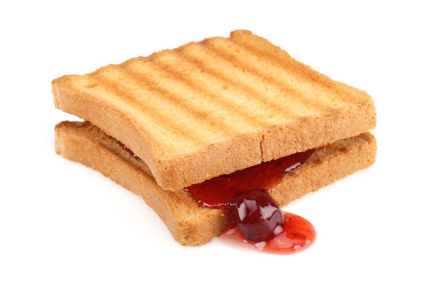 istock Toasted bread and strawberry jam isolated 1164847094