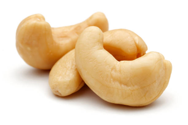 istock Roasted cashew nuts isolated on white 1164847442