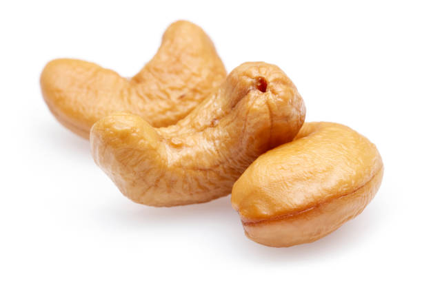 istock Roasted cashew nuts isolated on white 1164847726