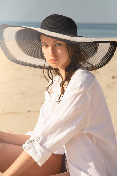 istock woman on sea beach 1164850598