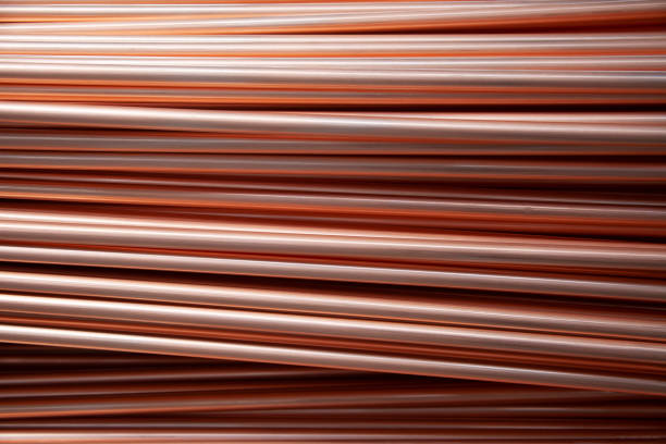 Copper pipes in factory, industrial background