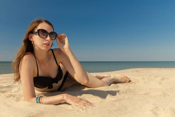 istock young woman in swimsuit 1164850691