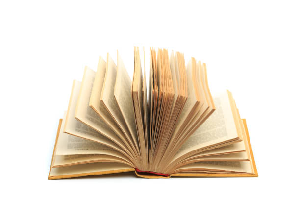 istock open vintage book isolated on a white background -Image 1164850974