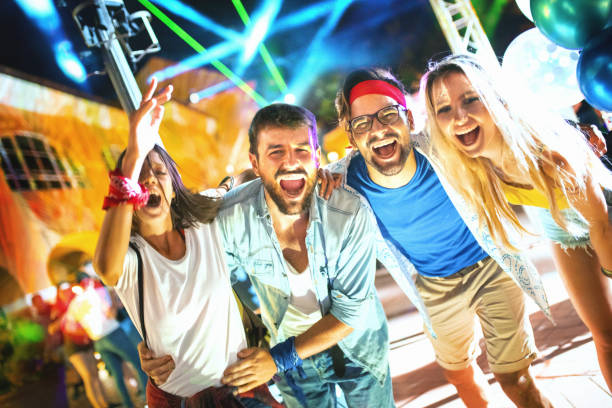 istock Group of youngsters at a concert. 1164851737