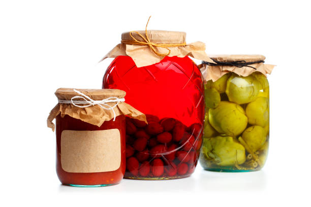istock set og  glass bottles with preserved food on white background - Image 1164852023